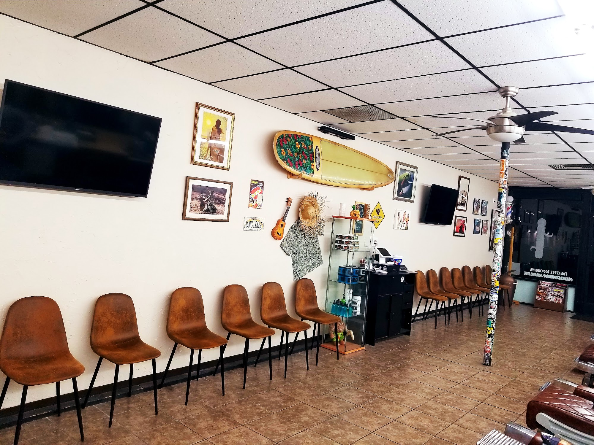 PH Barber waiting area with surf-inspired decor